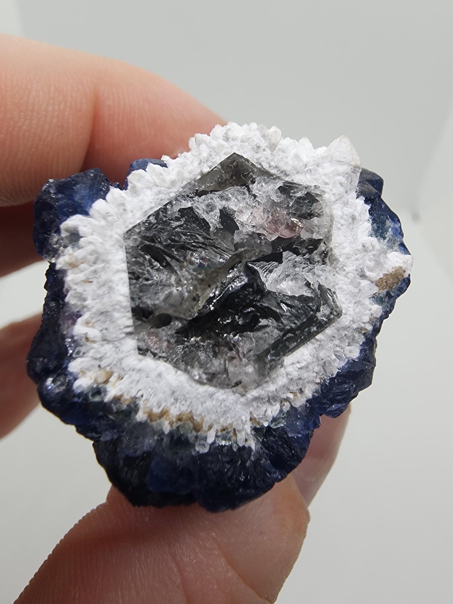 Blueberry Fluorite on Cactus Quartz Point from Huanggangliang, Inner Mongolia, China