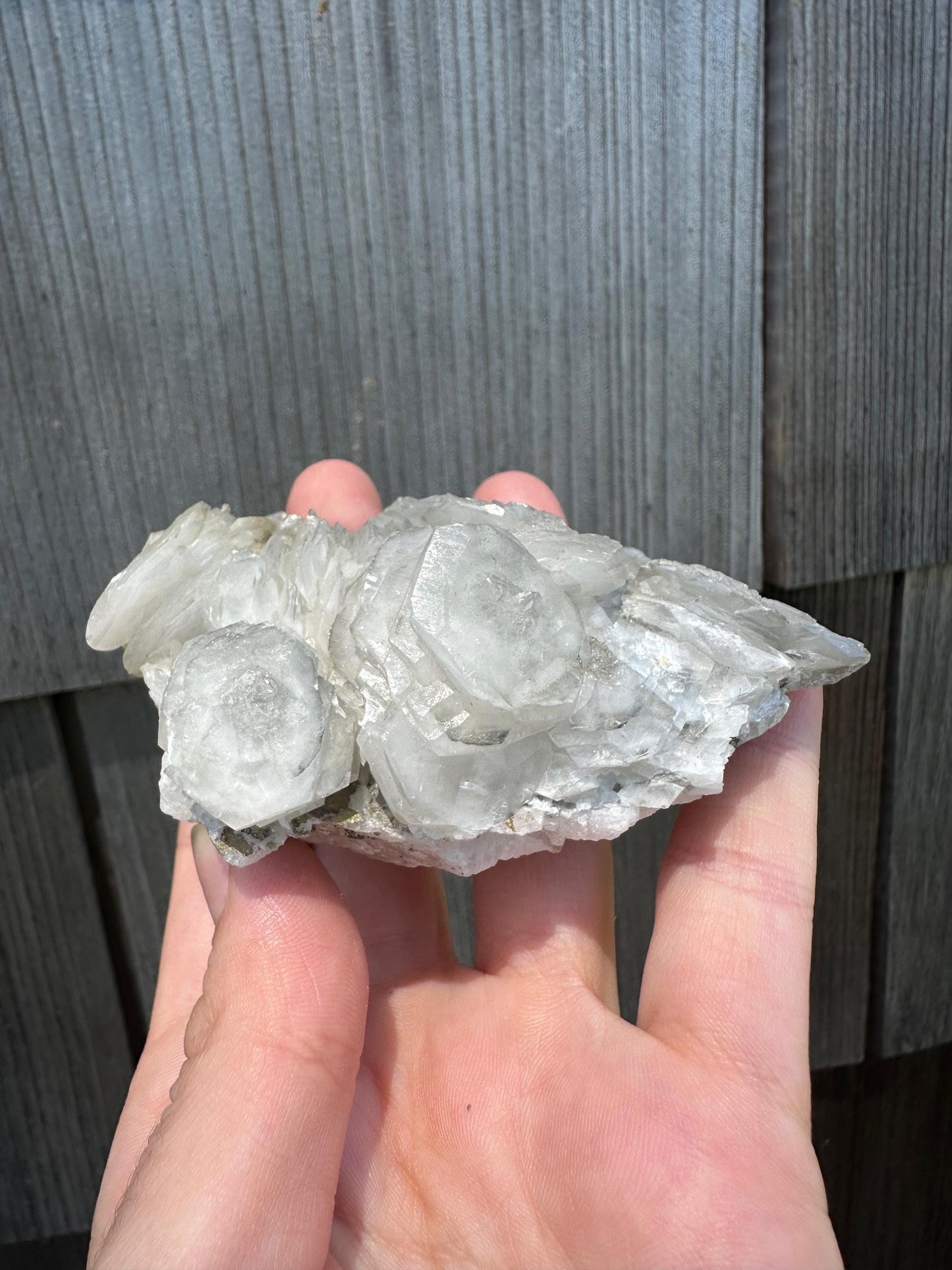 Fluorescent Poker Chip Calcite With Pyrite on Fluorite from Morocco